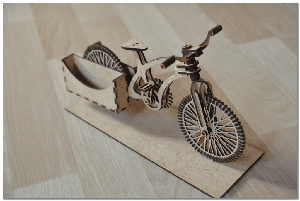 Bicicleta portatarjetas — vector para corte CNC