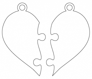 Dije de rompecabezas de corazón
