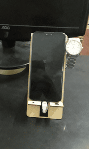 Base para celular y reloj