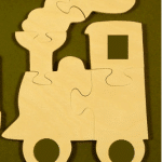 Te compartimos un vector descargable para reproducir un rompecabezas en forma de tren.  Utiliza tu máquina de corte CNC para la realización de este proyecto.