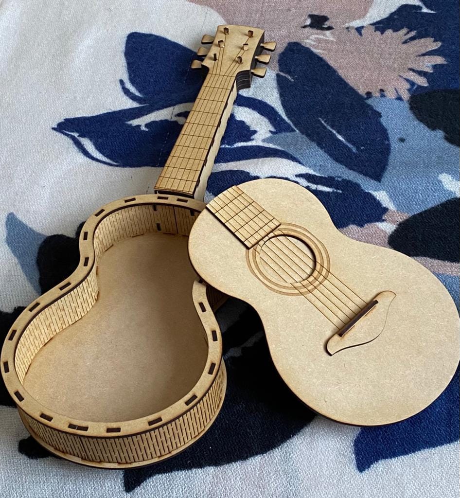vector descargable para reproducir una caja en forma de guitarra. Utiliza tu máquina de corte CNC para la realización de este proyecto.