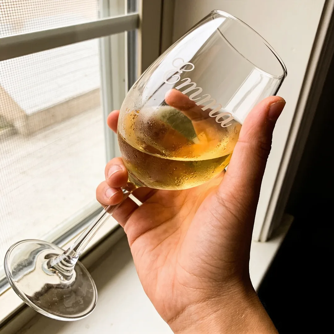 Engraved wine glass with a