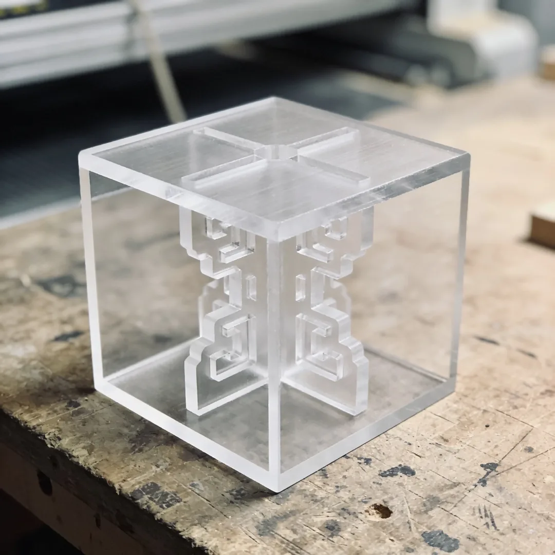 Carved acrylic display sta