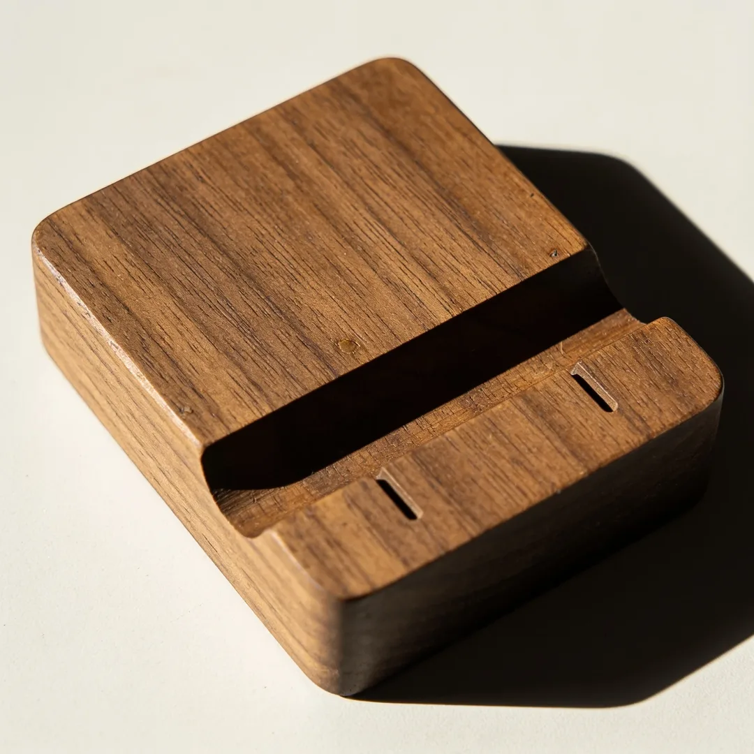 Wooden phone dock with rou