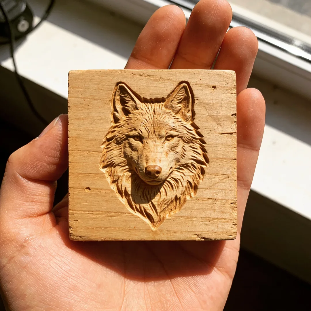 Carved wooden relief of a